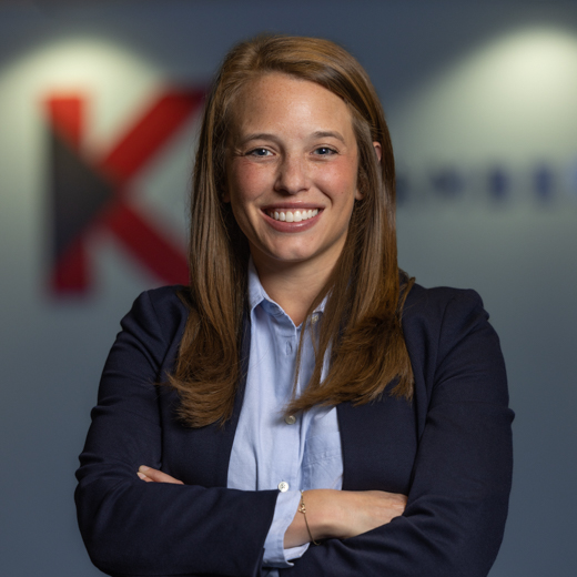 Photo of Erica Logan in front of KC Chamber logo