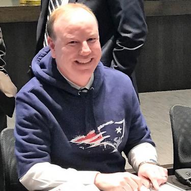 Joe Reardon Wears Patriots Sweatshirt