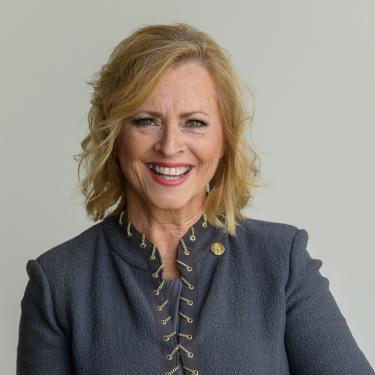 Photo of Mary O'Connor, Executive Vice President of Logistics and Creative Brand Management, Country Club Bank