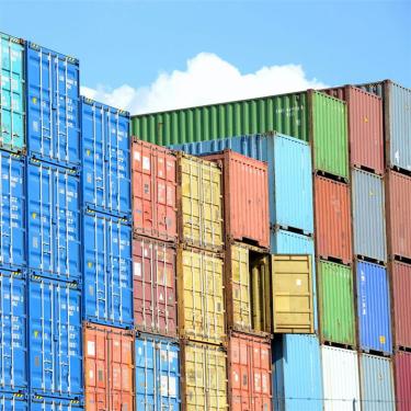 Photo of stacks of shipping containers