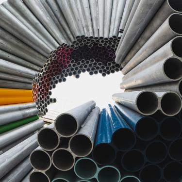Photo of pipes arranged to create a spherical space.