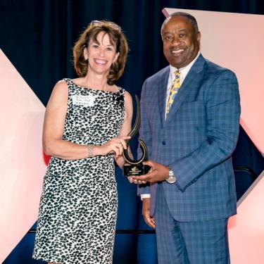 Demi Lloyd, DEMDACO, receives the Legacy of Kansas City Award