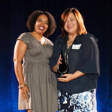 Grace Ahn receives the 2023 Emerging Small Business of the Year award for NvisionKC
